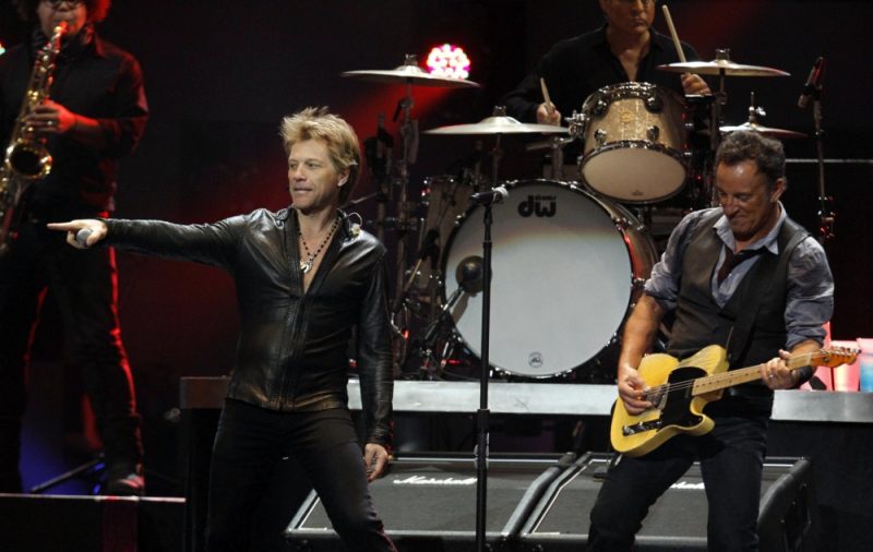 jon-bon-jovi-joins-bruce-springsteen-on-stage-during-the-12-12-12-benefit-concert-for-victims-of-superstorm-sandy-at-madison-square-garden-in-new-york-ay_99730741