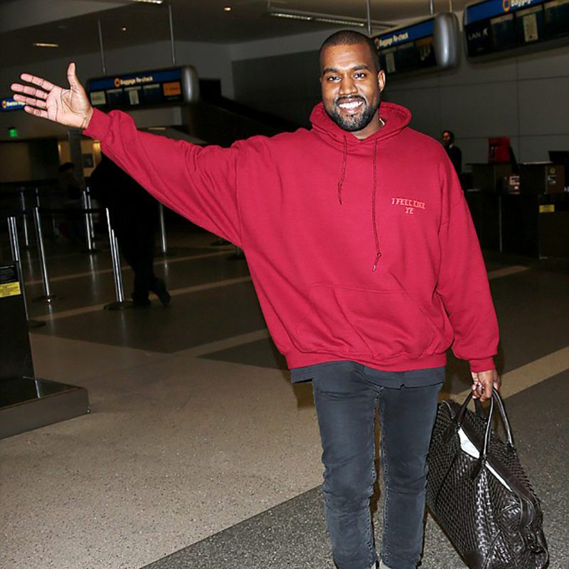 kanye west all smiles as he arrives at lax airport-1200x1200